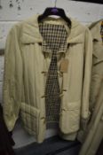 A Ladies Aquascutum quilted coat.