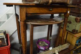 An oak side table and a butlers style tray table.
