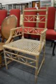 A limed beech faux bamboo armchair.