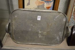 A Tudric pewter twin handle tray.