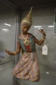 A large Lladro pottery model of an Eastern dancer.