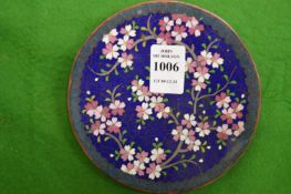 A small cloisonne dish.