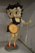 A painted cast iron model of Betty Boop.