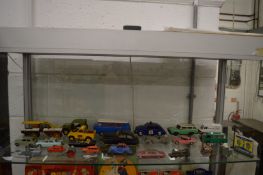 Early toy cars and other items.
