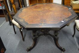 A Victorian marquetry inlaid ebony and amboyna octagonal shaped centre table (faults).