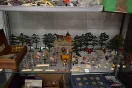 A good collection of painted di-cast farmyard animals, figures and accessories.