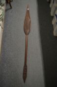 An African carved wood paddle style spear.