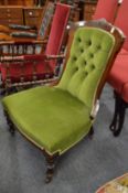 A Victorian green draylon upholstered nursing chair.