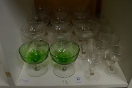 A set of nine etched champagne glasses etc.