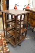 An oak revolving bookcase.