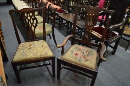 A 19th century elm dining chair with arms together a similar mahogany dining chair.