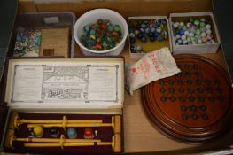 Toys and games to include solitaire board, various marbles, table croquet set, boxed etc.