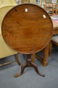 A 19th century mahogany tilt-top tripod table.