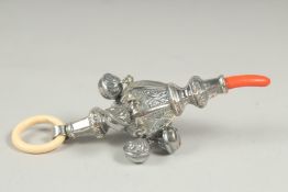 A baby's rattle and teething ring.