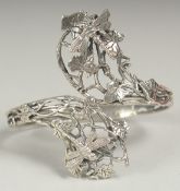 A silver naturalistic dragonfly ring, size Q+, in a box.