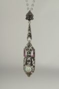A silver marcasite ruby and opal pendant and chain in a box.