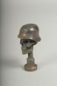 A replica WWI skull tamper, 4cm.