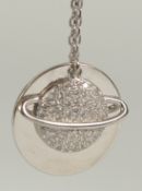 A silver plated pendant and chain in a box.