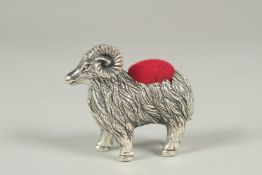 A silver ram pin cushion, 3cm.