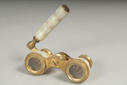A pair of bone opera glasses.