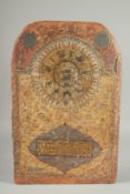 AN OTTOMAN GILDED STUCCO WOOD PANEL, HAJJ MECCA, dated 1276 / 1860, 46cm x 29.5cm.