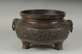 A FINE LARGE BRONZE TWIN HANDLE CENSER, with relief decorated band of flowers, the handles formed