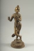 A FINE 17TH - 18TH CENTURY TIBETAN OR NEPALESE BRONZE FIGURE of fluting Krishna, 15.5cm high.