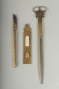 AN OTTOMAN TURKISH GOLD INLAID CALLIGRAPHER'S SET; comprising scissors, bone mounted makta, and