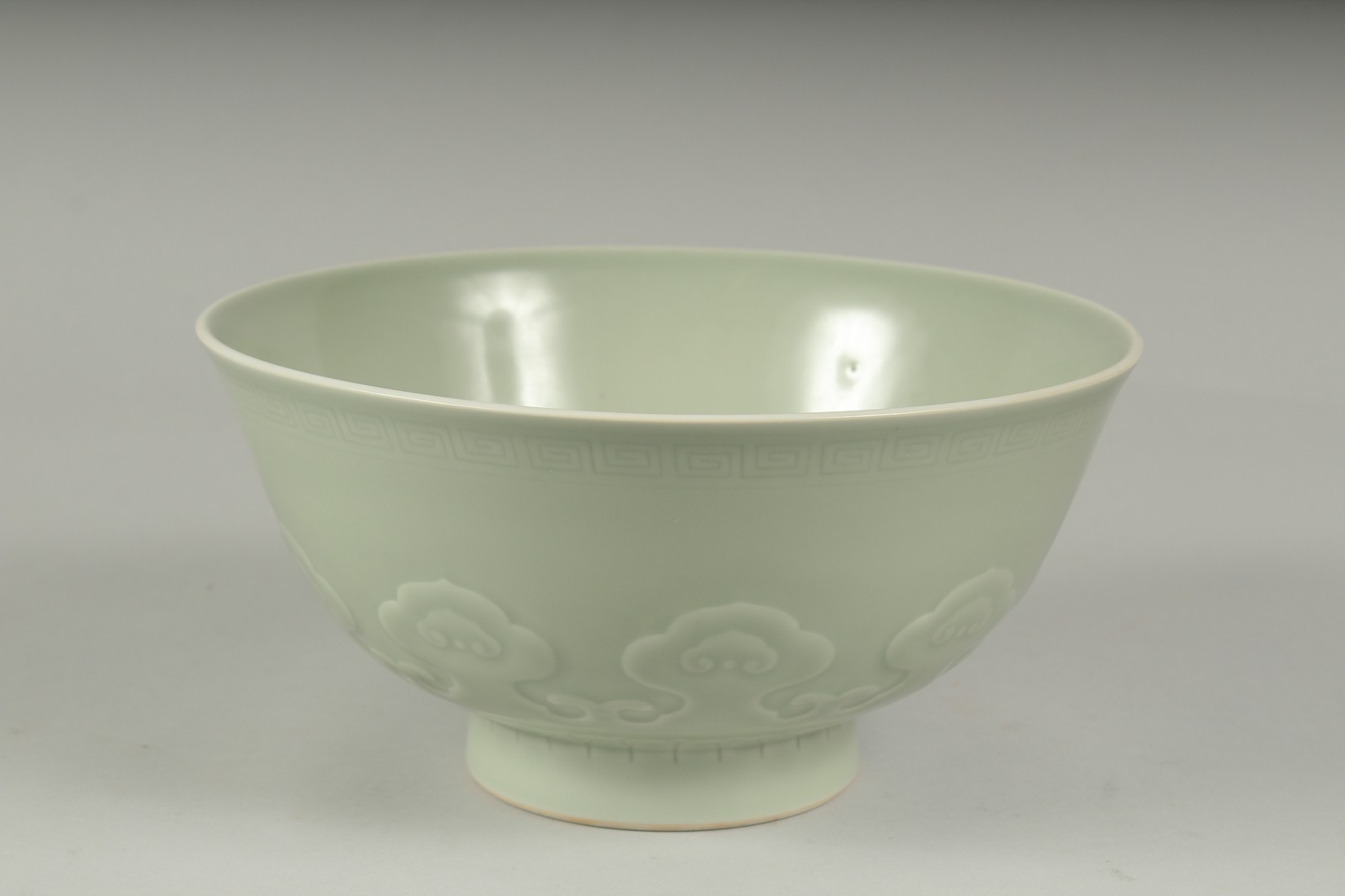 A LARGE CHINESE CELADON GLAZE PORCELAIN BOWL - POSSIBLY REPUBLIC PERIOD, the exterior with a band of