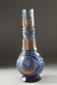 A 19TH CENTURY ISLAMIC, OTTOMAN MARKET, ENAMEL OVERLAID BOHEMIAN GLASS HUQQA BASE, 29.5cm high.