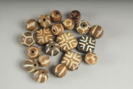 A COLLECTION OF DZI BEADS.