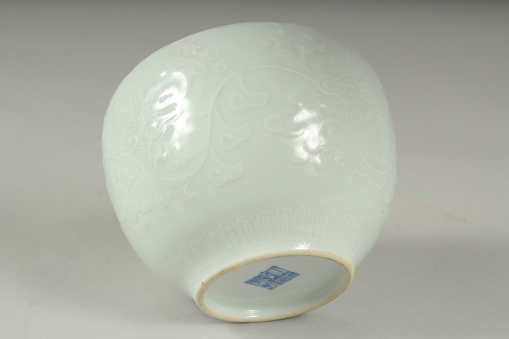 A CHINESE REPUBLIC PERIOD WHITE CELADON PORCELAIN POT, with carved ruyi stylised foliate decoration, - Image 6 of 7
