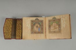 A 19TH CENTURY MOROCCAN LEATHER BOUND ILLUMINATED COLLECTION OF PRAYERS INCLUDING DALA'IL AL-
