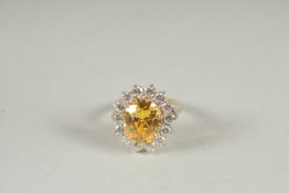 A SILVER GOLD PLATED CLUSTER DAISY RING.