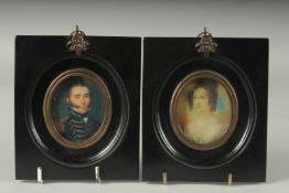 A PAIR OF FRAMED MINIATURES.