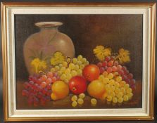 20th Century, A still life of mixed fruit with an urn, oil on canvas, indistinctly. Signed, 18