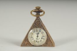 A TRIANGULAR MASONIC METAL WATCH.