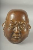 A BRONZE FOUR FACED BUDDHA. 8ins high.