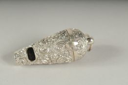 A SILVER REPOUSSE WHITSLE VINIGRETTE. 6cm long.