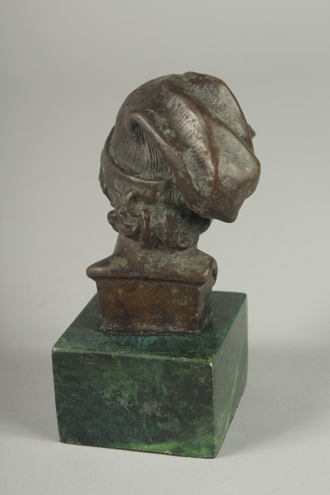 A SMALL BRONZE BUST OF A YOUNG MAN. Signed, 4ins high on a marble base. - Image 2 of 2