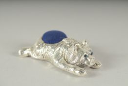A SILVER BEAR PIN CUSHION. 3cm