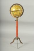 A MINIATURE GLOBE on a stand.