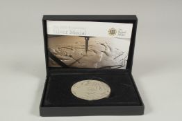 THE ROYAL MINT. THE 2010 ROYAL MINT SILVER MEDAL. The reverse traditional hand struck. Boxed.