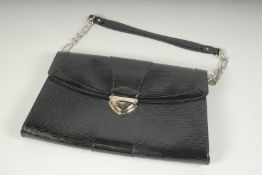 A LOUIS VUITTON BLACK PATENT BAG in original box.