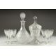 A GOOD CUT GLASS SHERRY DECANTER AND STOPPER, SIX GLASSES AND BOWL AND COVER.(8). - Image 1 of 5
