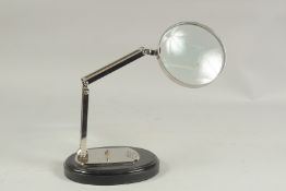 A MAGNIFYING GLASS on a stand.