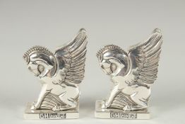 A PAIR OF DECO DESIGN HORSE SALT AND PEPPERS.