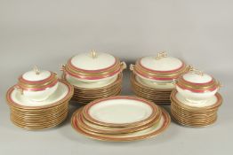 A MAPLE OF LONDON PORCELAIN DINNER SERVICE with blue and gilt border comprising two circular
