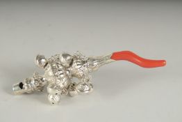 A SILVER AND CORAL BABIES RATTLE.