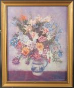 C.D. Bullough, A still life of mixed flowers in a blue and white jug, pastel, signed, 14.5